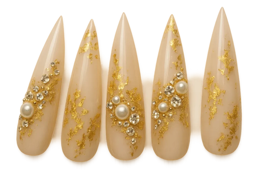 Luxury embellished stiletto nails with crystals and gold accents