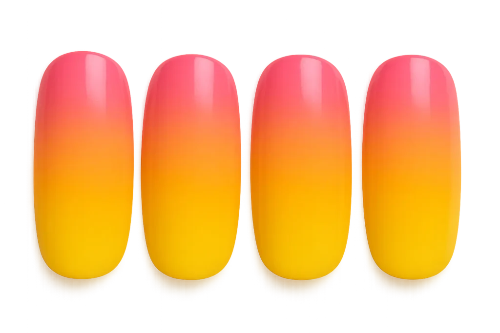 Pink orange yellow ombre nail design showcasing sunset colors