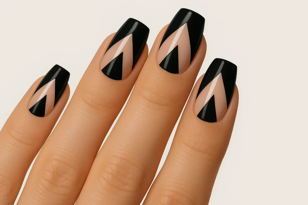 Negative space triangle black French tip design