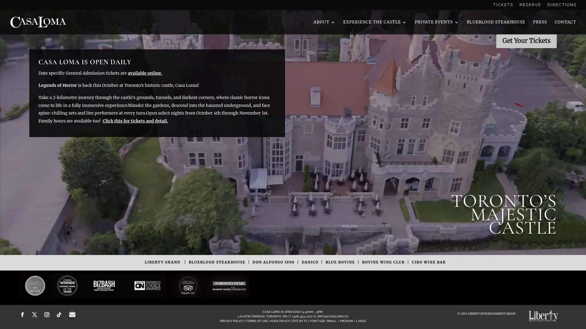 Casa Loma castle exterior with manicured gardens and Gothic architecture