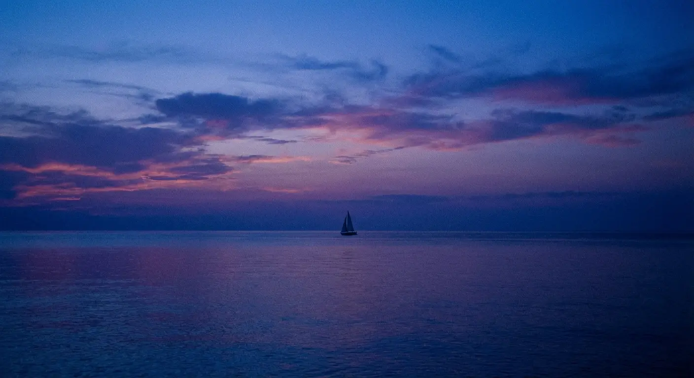 Ship sailing at sunset, a metaphor for elegy