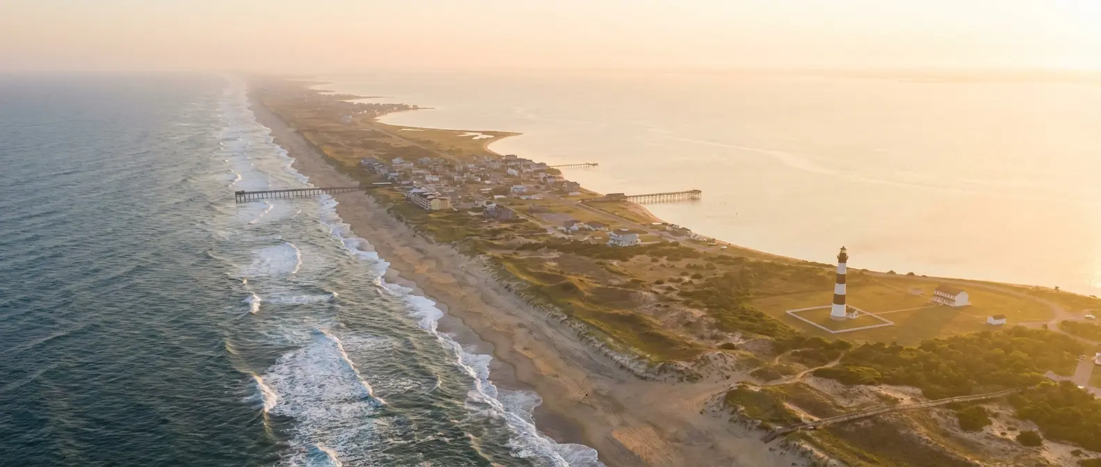 Group of guys toasting drinks at a beach house party